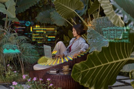 AI Asian woman working from home sitting in garden