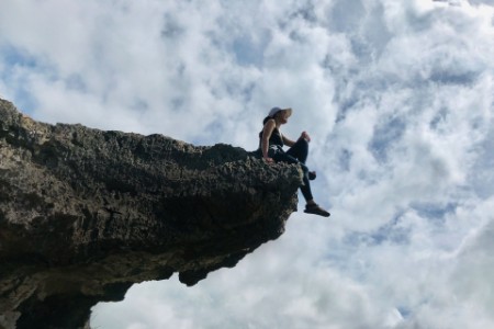 Low angle of woman on rock